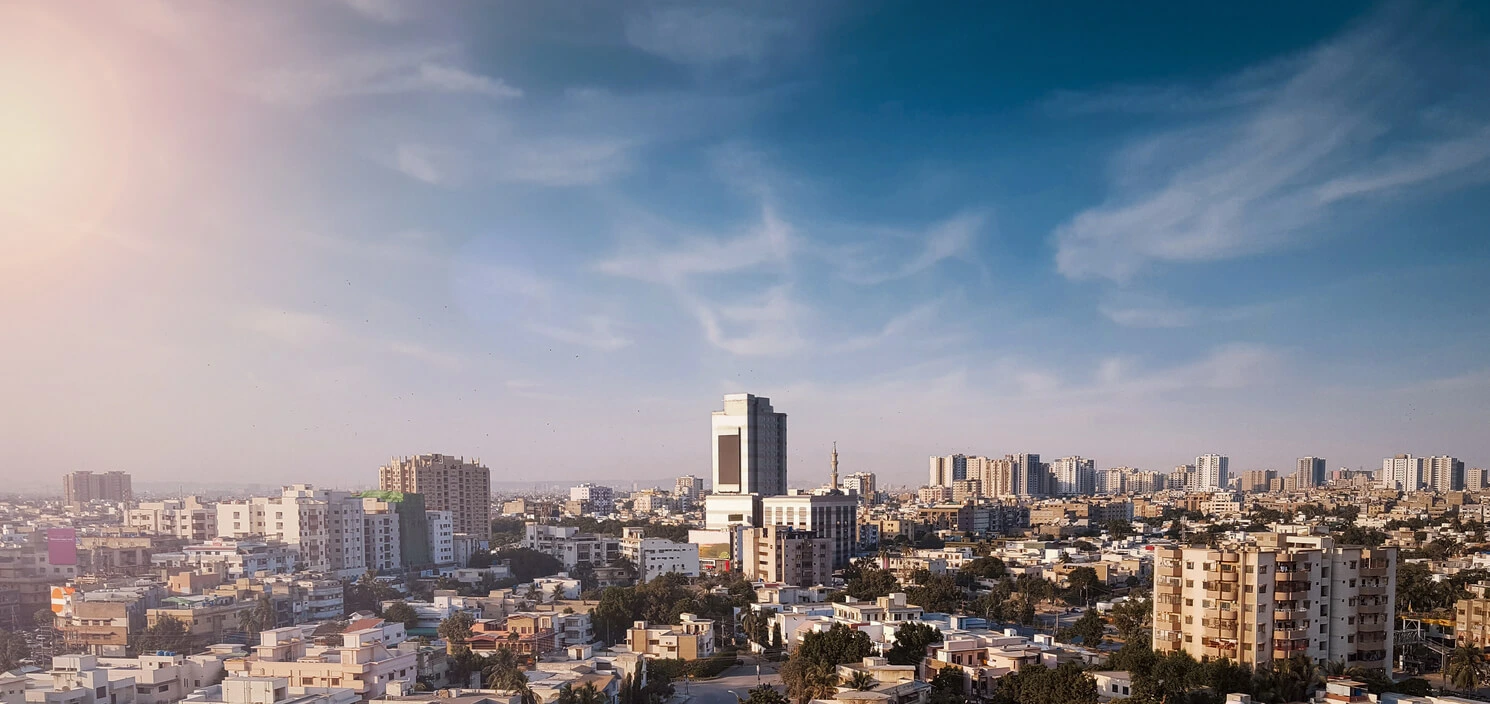 DHA Karachi vs Bahria Town Karachi: Complete Investment & Living Guide 2026
